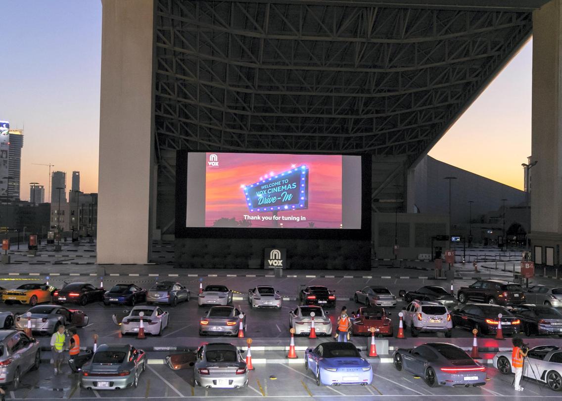 VOX cinema holds a drive-in experience on the roof of Mall of Emirates for all the movie-lovers projecting the video on a large screen with snacks included