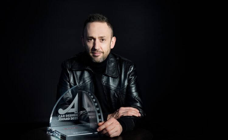 PEUGEOT - Mattias Hossann receives award for card design