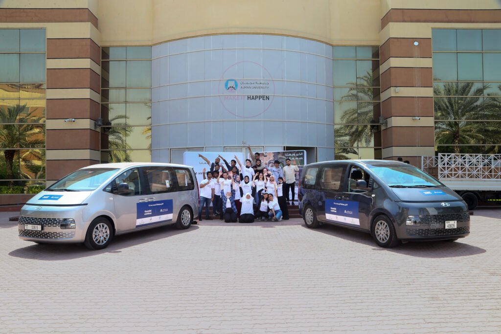 Ajman university students participating in Hyundai Continue Mobility for Food Bank Campaign