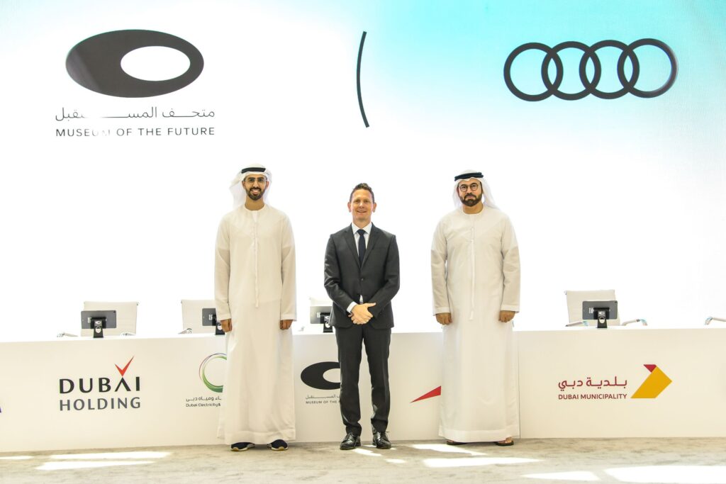 Omar bin Sultan, Carsten Bender and HE Mohammed bin Abdullah at Gergawi sign up Audi as official partner of Museum of the Future
