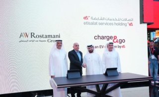 AW Rostamani Group and e& sign partnership to drive EV adoption across the UAE